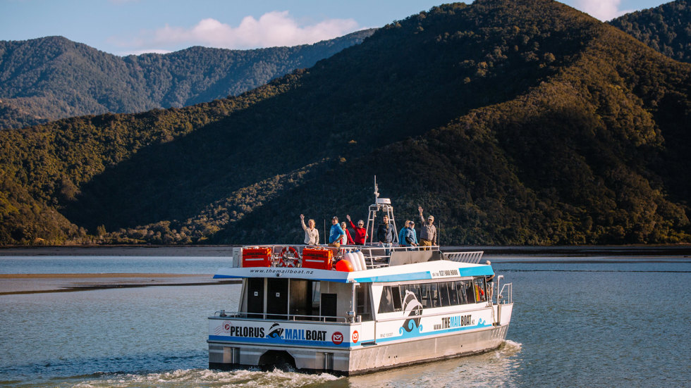 MV Pelorus Express, the vessel for our Pelorus Mail Boat cruises, cruising out of Havelock towards the Marlborough Sounds.